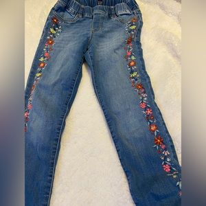 GAP Girls embroidered skinny jeans.